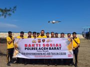 Sambut HUT Bhayangkara ke-80, Satreskrim Polres Aceh Barat Gelar Bakti Sosial Bersih Pantai dan Gotong Royong Sekolah