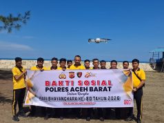 Sambut HUT Bhayangkara ke-80, Satreskrim Polres Aceh Barat Gelar Bakti Sosial Bersih Pantai dan Gotong Royong Sekolah