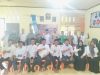 Kapolsek Woyla Timur Hadiri Pelantikan Tuha Peut dan Aparatur Gampong, Perkuat Sinergi Jaga Kamtibmas